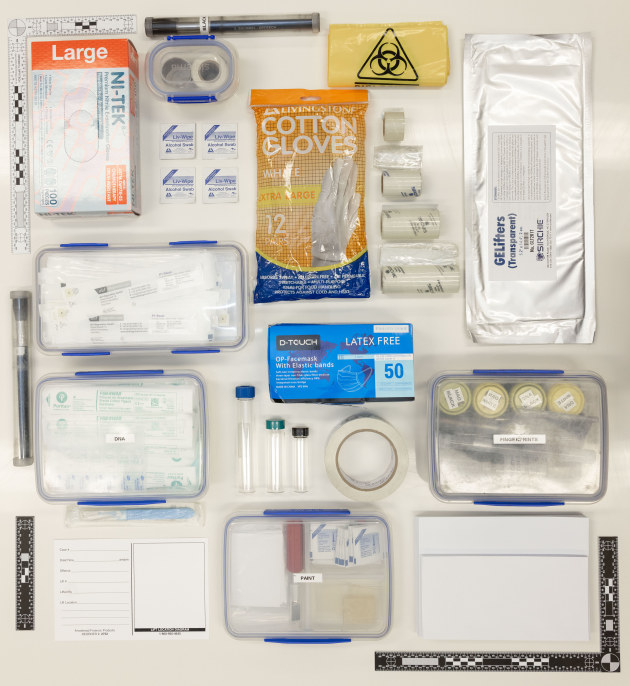 In addition to their cameras, crime scene investigators carry a multi-purpose forensics kit for their work in the field. This can include fingerprint brushes and powders in different colours for different surfaces and contrasts, DNA sampling kits (swabs), PPE (gloves), rulers, fingerprint lifting tape rolls, gel lifts (similar to tape and mostly used for shoe marks), evidence envelopes, hazmat bags, evidence tape, glass vials for evidence collection and a paint sample collection kit.