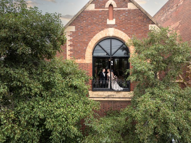 Visiting a venue prior to a wedding gives you a chance to explore and plan for some of the more interesting ideas. This window was on the first floor of a building, and given it was going to be near impossible to make this photo from street level I brought along my drone to quickly get this photo.