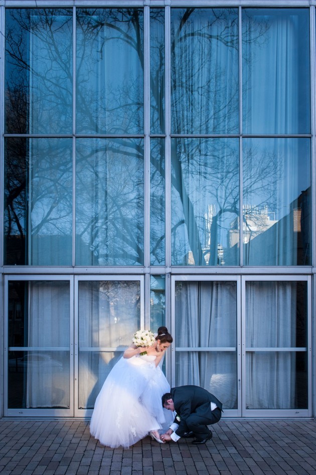 As is often the case during the wedding, the bride will often need a hand with her wardrobe; when this bride asked her husband for a hand adjusting her shoes, it just happened to be in front of this interesting pocket of light. Nikon D3, 24-70mm f2.8 lens @ 27mm. 1/250s @ f5.6, ISO 400.